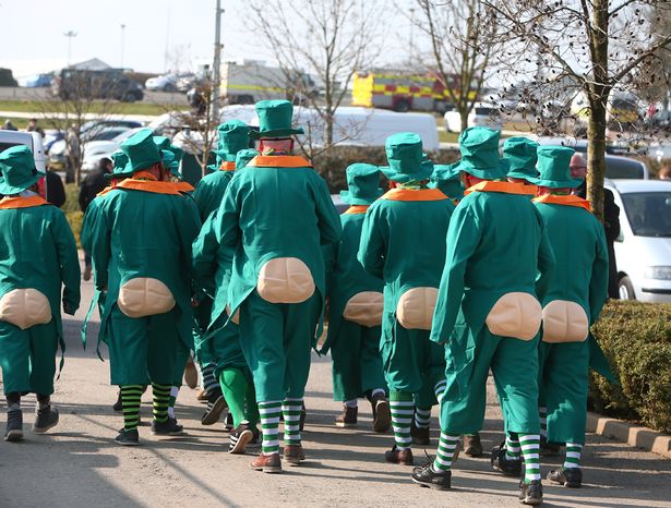 Race goers dress up for St Patrick`s day at Cheltenham races